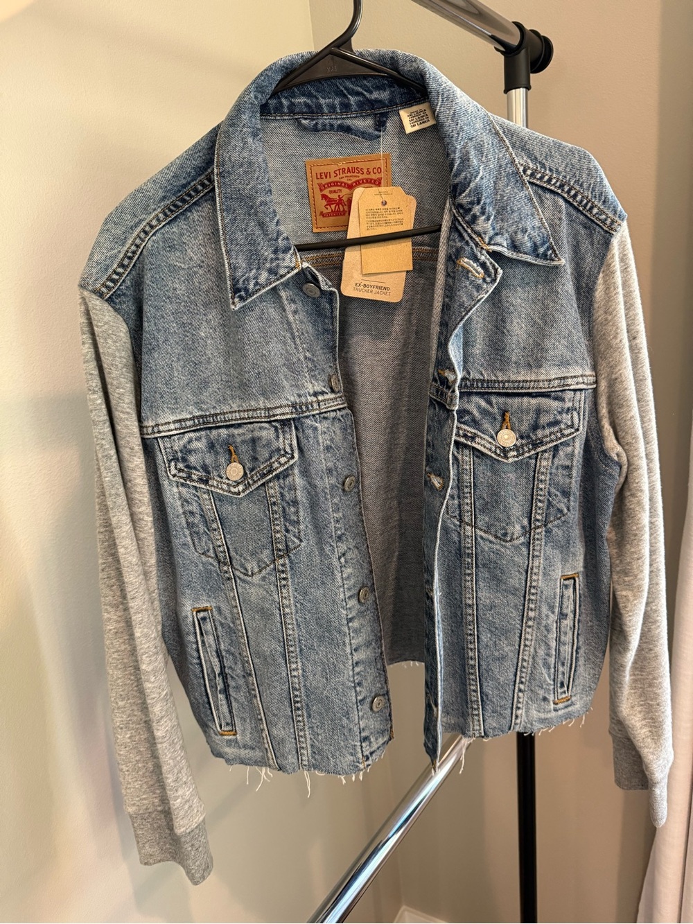 Levi's Blue Denim Trucker Jacket with Gray Sweatshirt Sleeves